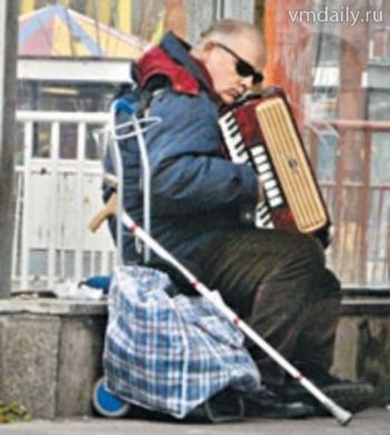 Старий акордеоніст